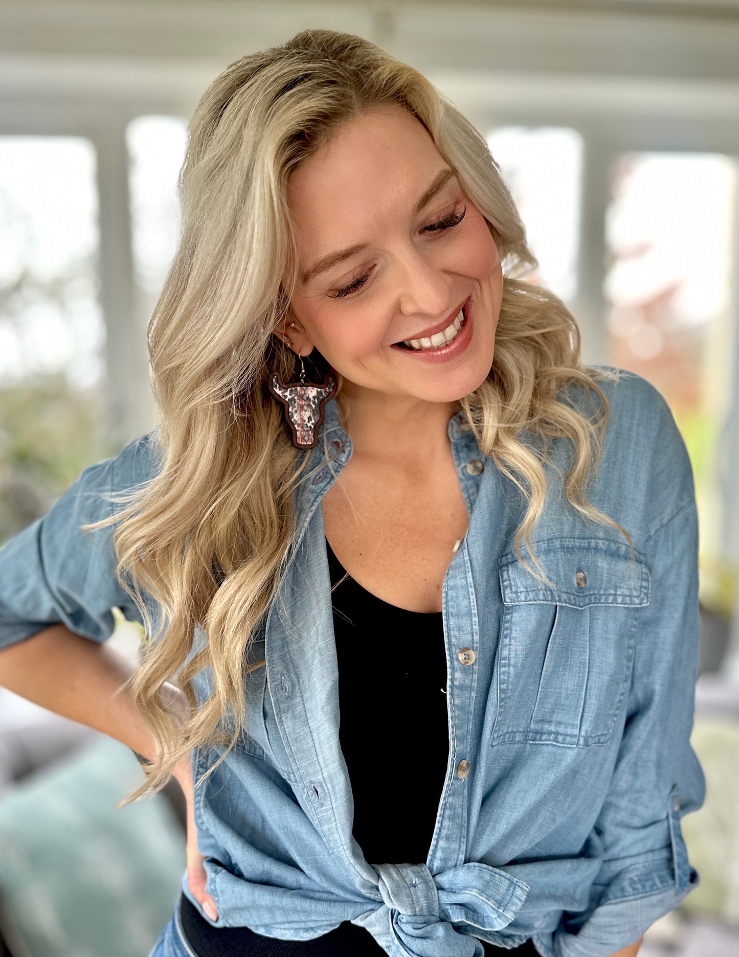 "Wooden cow head earrings with bold Aztec print design and minimalist version, perfect for boho and rustic style lovers."