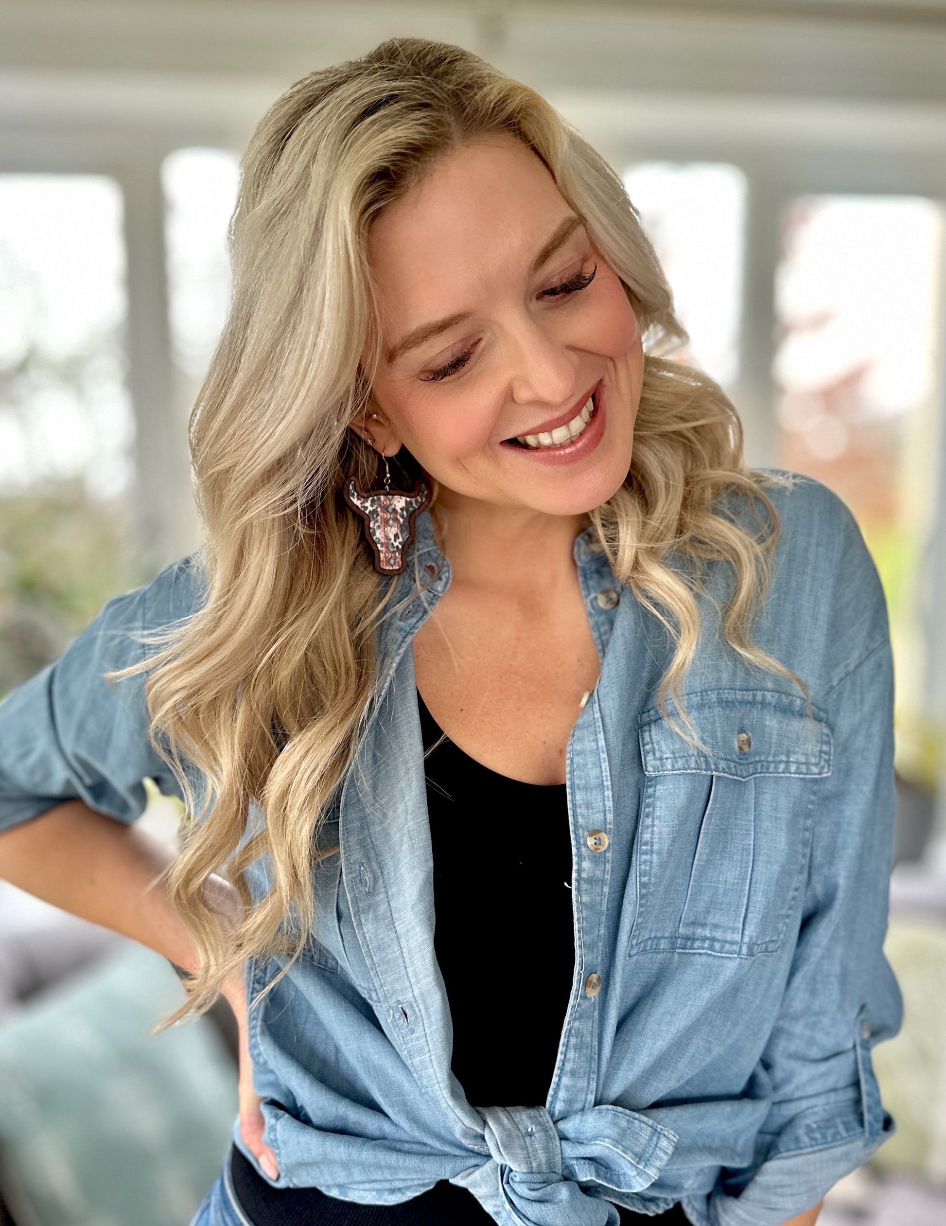 "Wooden cow head earrings with bold Aztec print design and minimalist version, perfect for boho and rustic style lovers."
